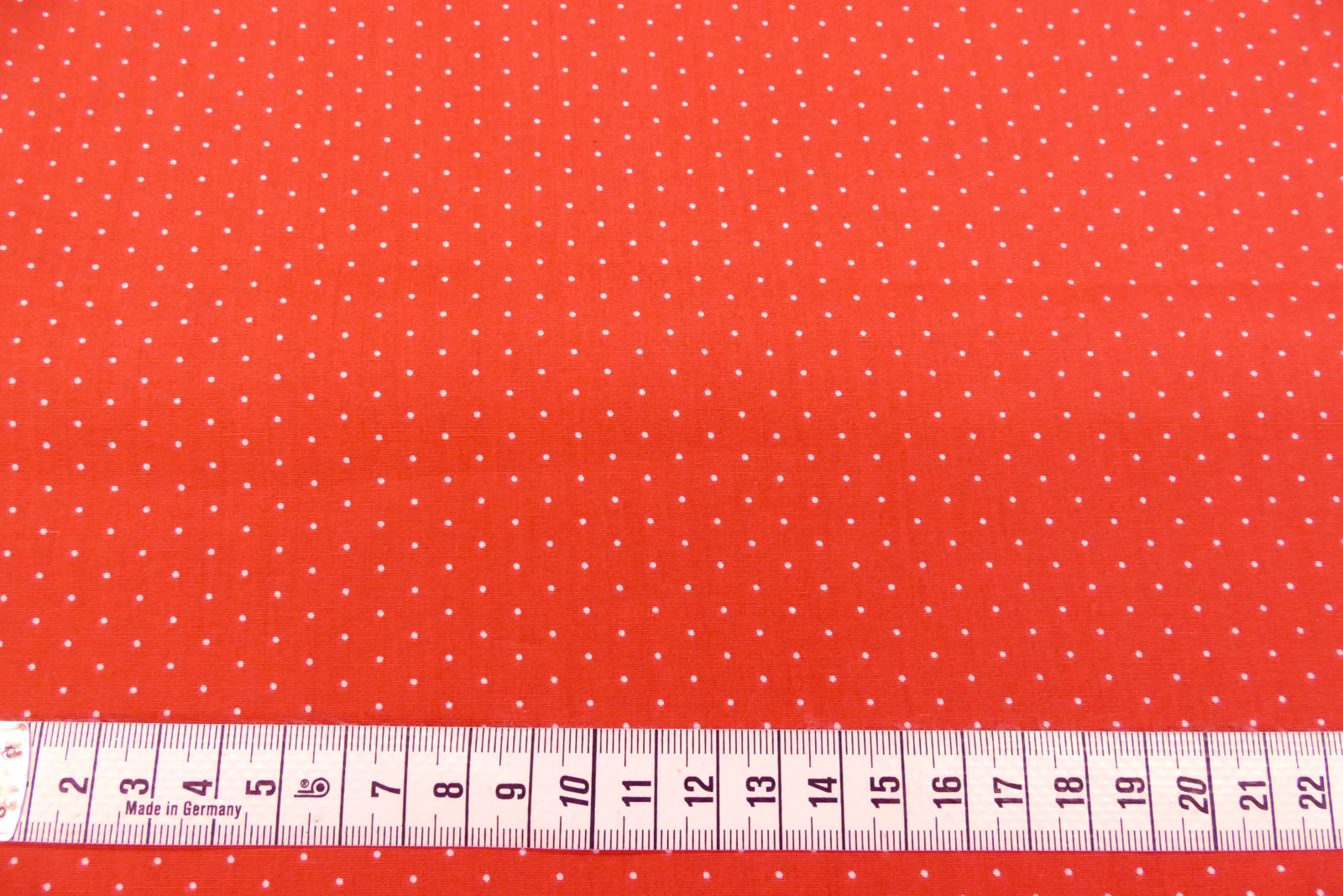 Baumwollpopeline Tupfen rostorange