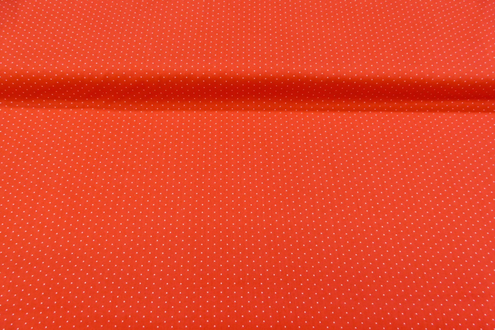 Baumwollpopeline Tupfen rostorange